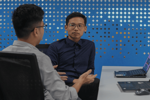 Two professionals using secure online faxing to protect sensitive information in the digital age